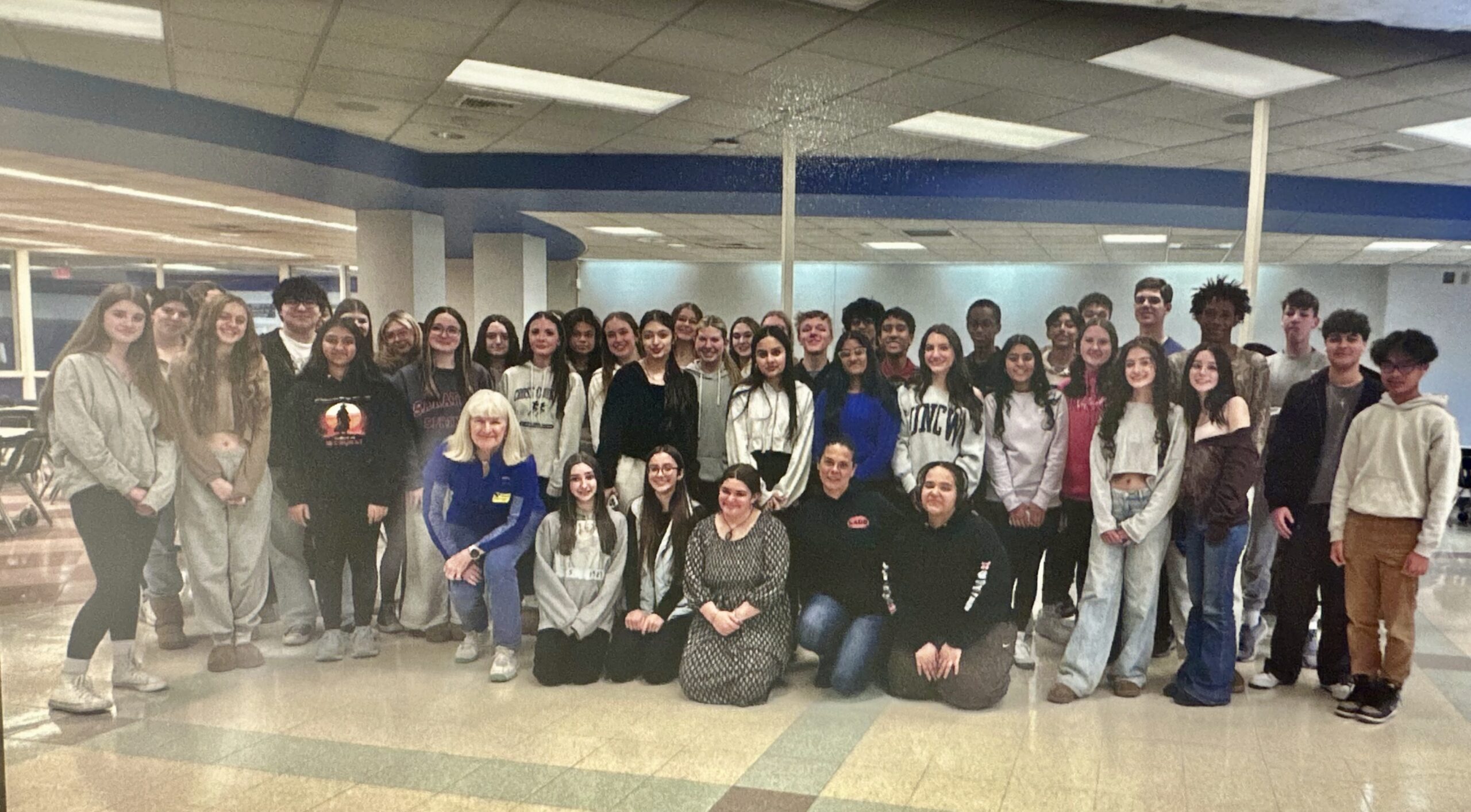 Nazareth High School Key Club collects over 300 books for Cops ‘n’ Kids Easton